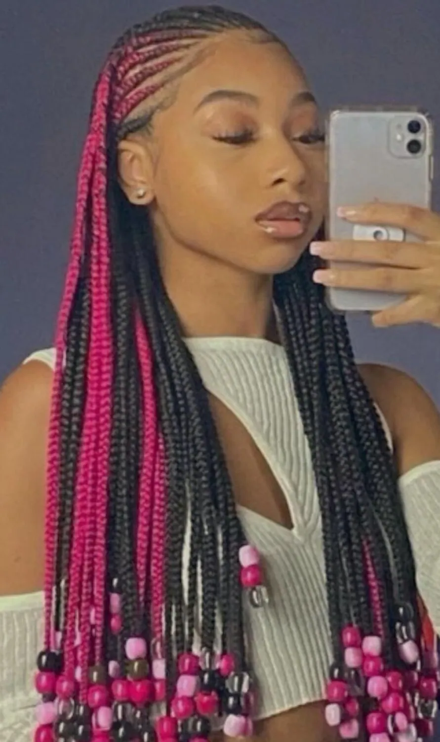 Black and pink peekaboo braids